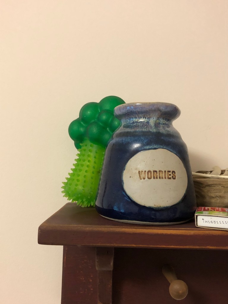 A picture containing indoor, table, sitting, small

Description automatically generated