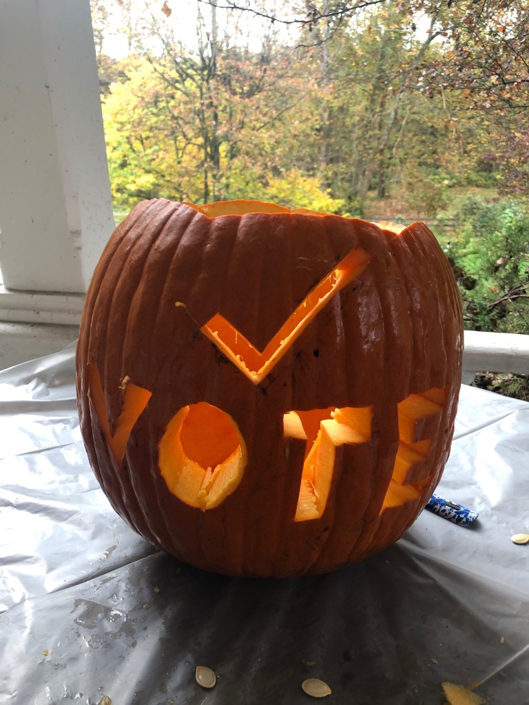 A picture containing table, sitting, lamp, food

Description automatically generated